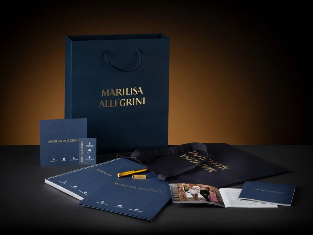 Immagine coordinata di Marilisa Allegrini: shopper, cartelline e quaderni
