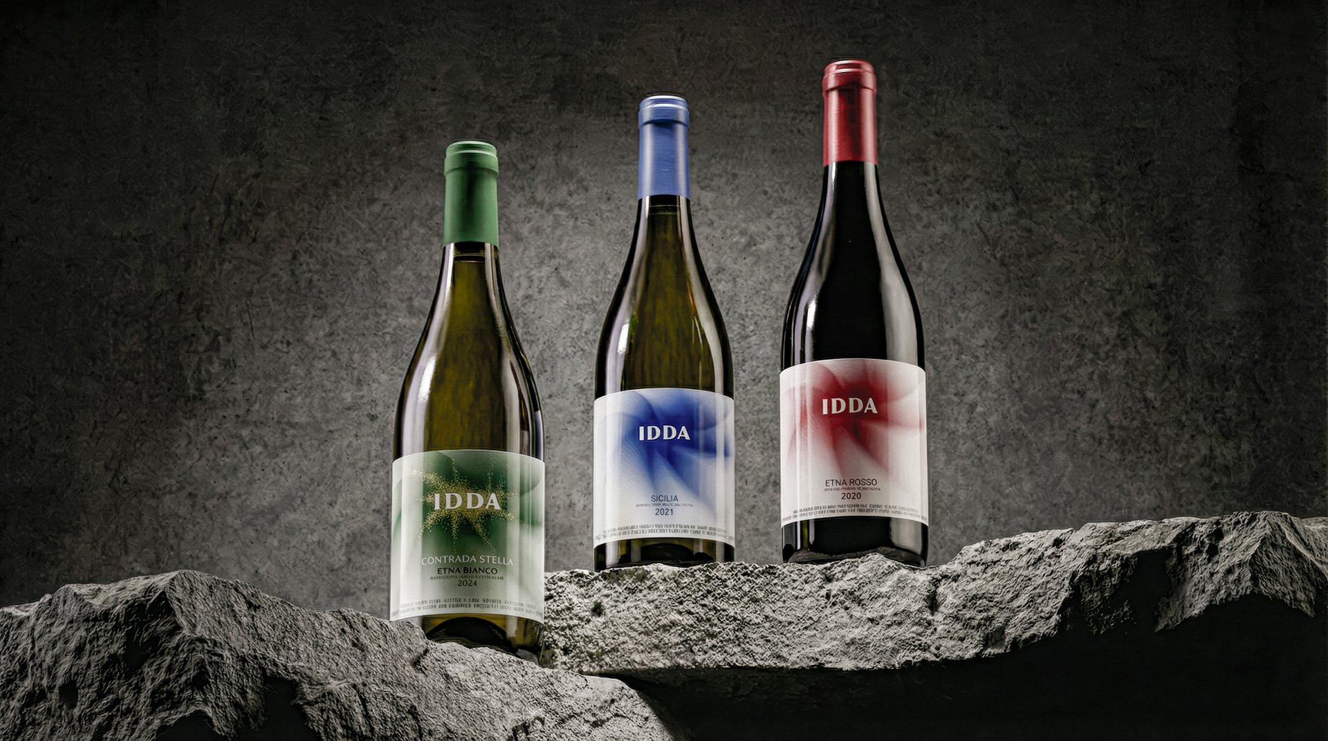 le tre versioni dell'etichetta di IDDA di Gaja: il nostro restyling e le due etichette vino precedenti